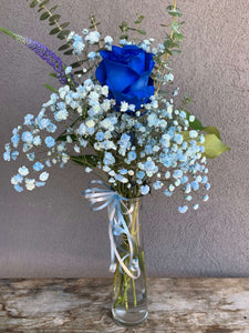 Blue rose and haze grass with eucalyptus. Blue flower means mystery and true love. 